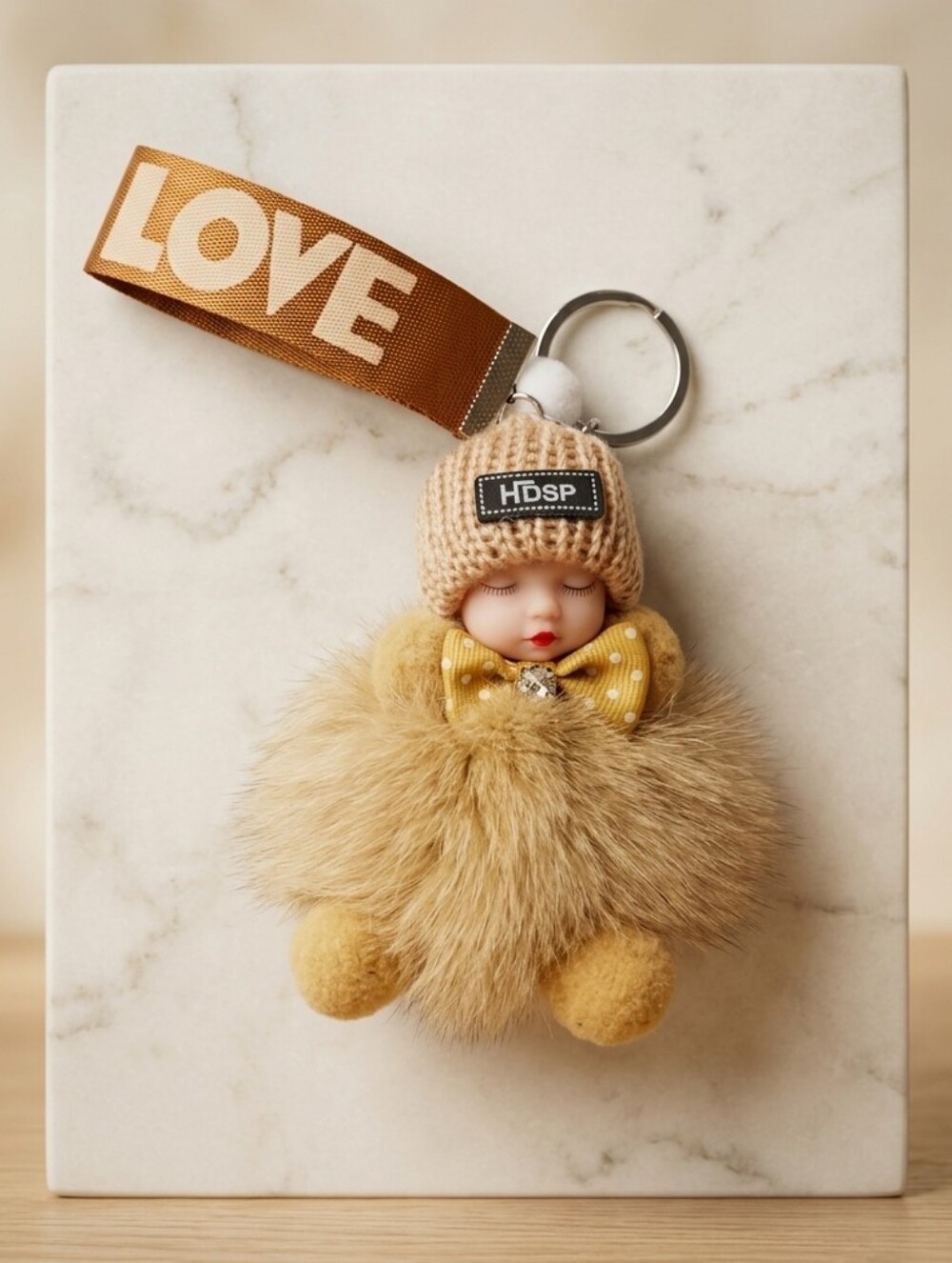 Pompom Sleeping Baby Keychain